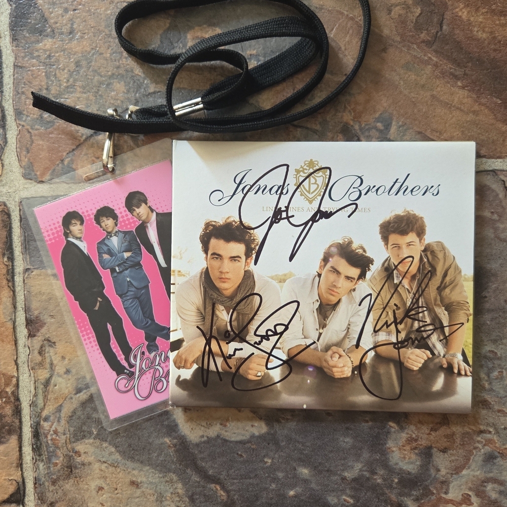 Signed Jonas Brothers CD with Lanyard